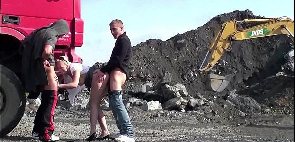 Young cute blonde girl public sex threesome at a construction site